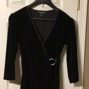 Black polyester velvet dress.